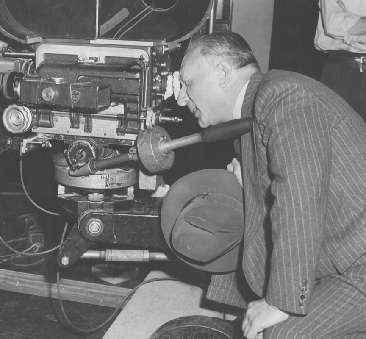 Harry M. Warner, president of Warner Brothers, on the set of MISSION TO MOSCOW